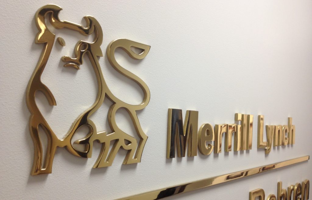 polished brass letters make this rich lobby sign look amazing